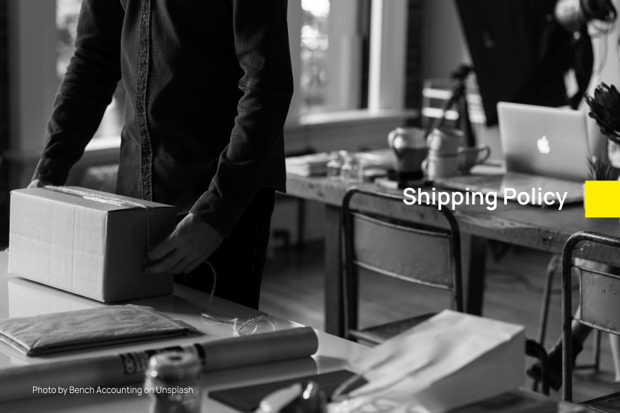Close up picture of a man getting a package ready to ship | Smolt Shipping Policy
