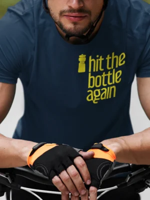 “hit the bottle again” typography graphic with a cycling water bottle illustration printed in yellow on a navy blue t-shirt | Smolt