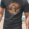 Winged chai glass graphic with “Frequent Stopovers For Chai Riders Club” typography printed on an asphalt grey t-shirt | Smolt