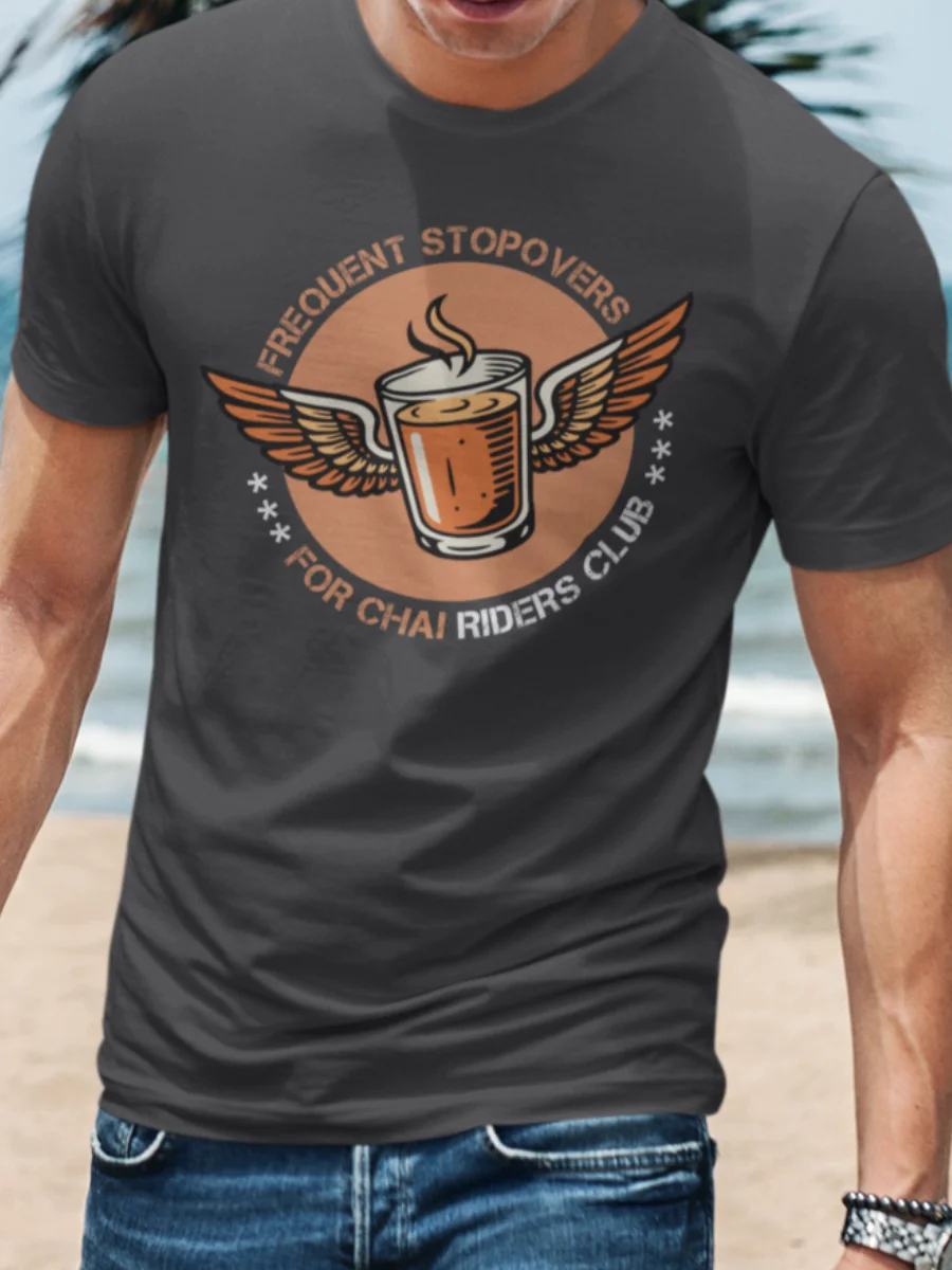Winged chai glass graphic with “Frequent Stopovers For Chai Riders Club” typography printed on an asphalt grey t-shirt | Smolt