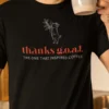 “thanks g.o.a.t. the one that inspired coffee” typography graphic with a goat and coffee plant illustration printed on a black t-shirt | Smolt