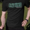 “Pedallers Anonymous” distressed typography graphic printed in teal and white on a black cycling t-shirt | Smolt