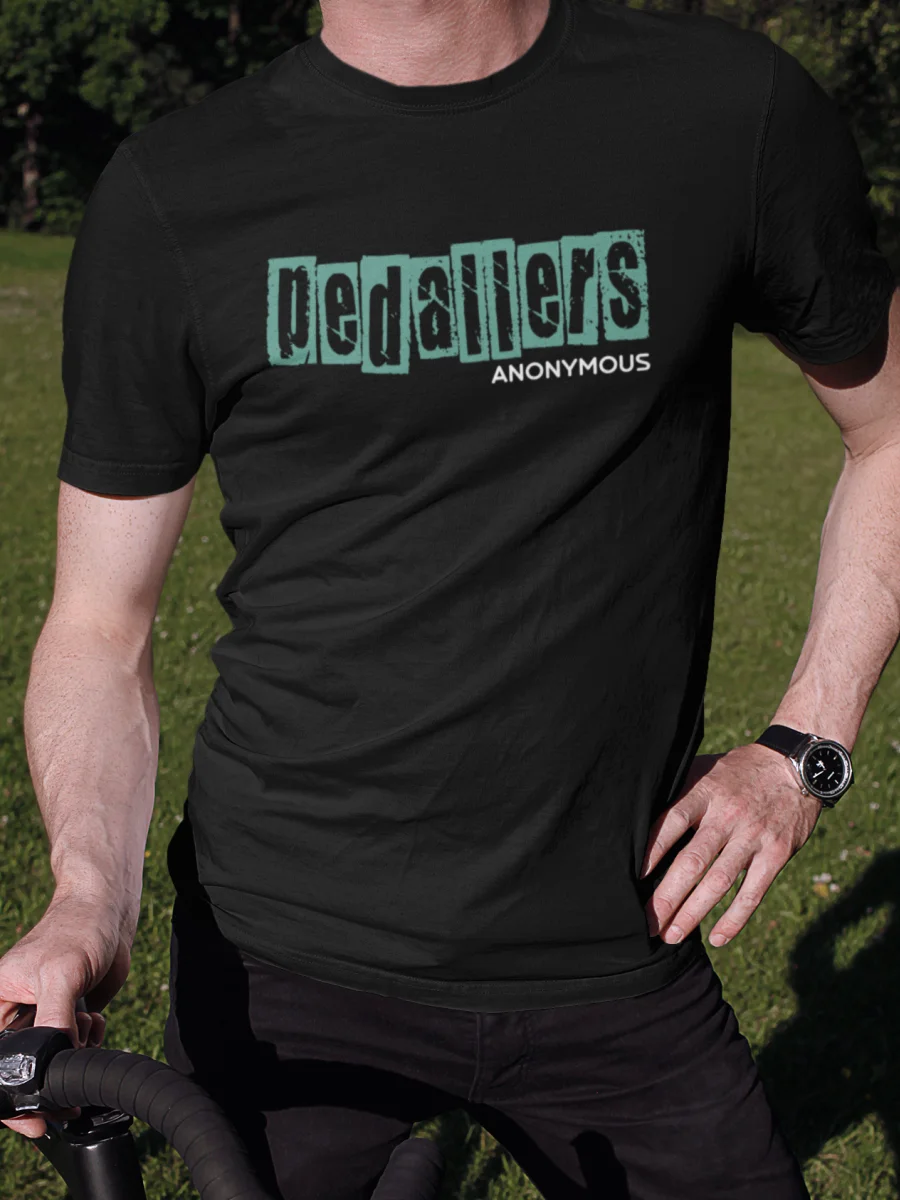 “Pedallers Anonymous” distressed typography graphic printed in teal and white on a black cycling t-shirt | Smolt
