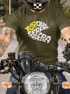 “Torque Sera Sera” playful motorcycle typography graphic printed in yellow and white on an olive green t-shirt | Smolt