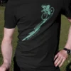 Minimal cyclist silhouette graphic with “Devour The Shadows” text printed in teal on a black cycling t-shirt | Smolt