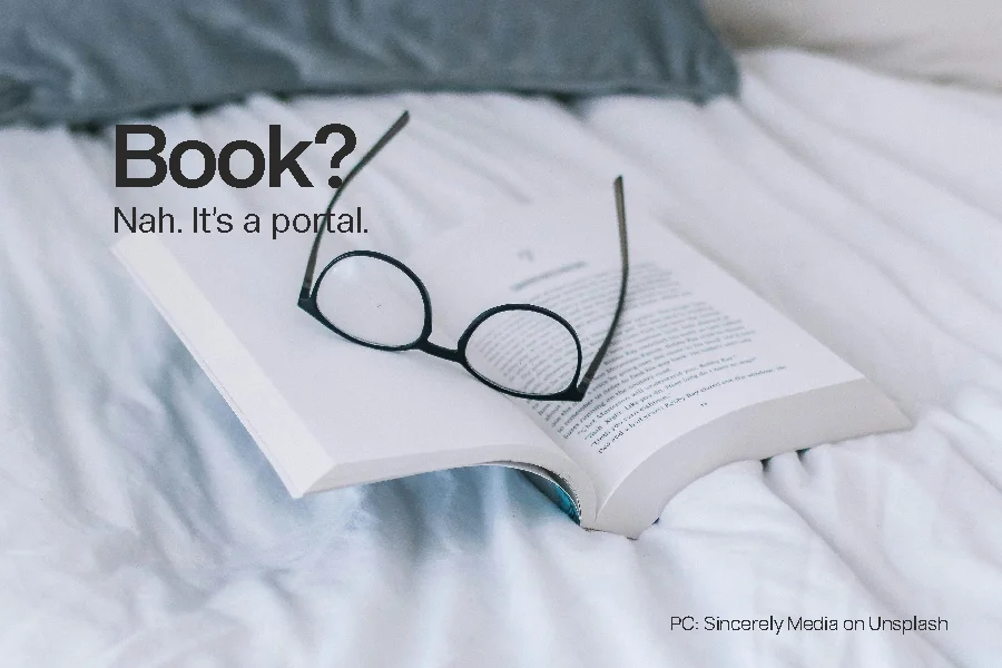 Book with open glasses depicting the Bookworms Category of tees | Smolt